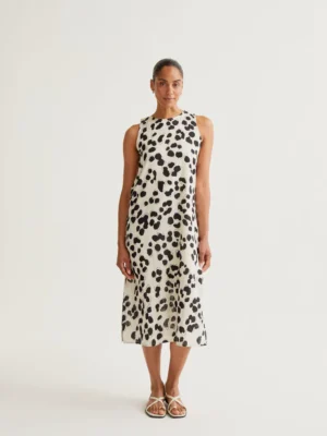 Vestido midi de algodón en tono beig clarito con manchas negras